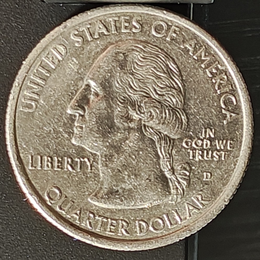 Weird-1999-D-Delaware-Quarter-Die-Chips-?